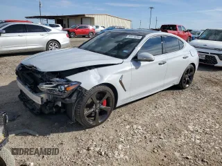 2020 Genesis G70 3.3T with VIN KMTG34LE3LU064052, listed as a Copart auction lot 83573294 with 56,514 mi miles and Salvage Title. Bid and sale history available at carsss.com. Image 1.