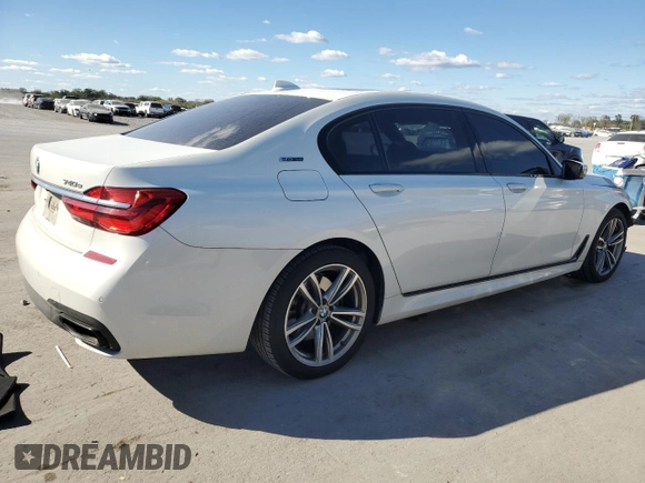 2018 BMW 7 Series 740e xDrive iPerformance with VIN WBA7J2C50JG938424, listed as a Copart auction lot 76085784 with 90,316 mi miles and Salvage Title. Bid and sale history available at carsss.com. Image 3.