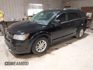 2016 Dodge Journey SXT with VIN 3C4PDCBG4GT206806, listed as a IAAI auction lot 41855100 with 169,554 mi miles. Bid and sale history available at carsss.com. Image 2.