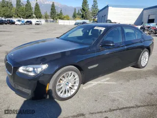 2014 BMW 7 Series 750i with VIN WBAYA8C5XED228235, listed as a Copart auction lot 85604144 with 0 mi miles and Salvage Title. Bid and sale history available at carsss.com. Image 1.