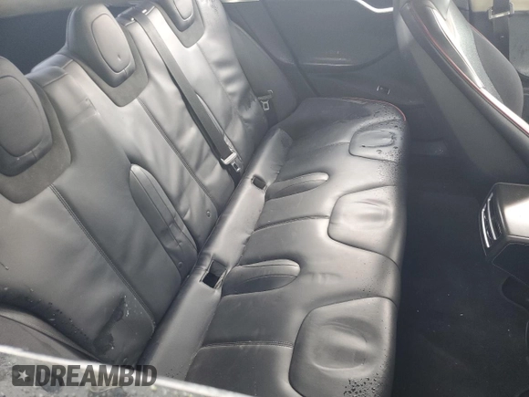 2014 Tesla Model S 60 with VIN 5YJSA1H14EFP28471, listed as a Copart auction lot 64928534 with 99,442 mi miles and Clean Title. Bid and sale history available at DreamBid. Image 10.
