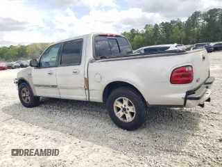 2002 Ford F-150 XLT with VIN 1FTRW07L12KA11845, listed as a Copart auction lot 51987205 with 282,865 mi miles and Salvage Title. Bid and sale history available at carsss.com. Image 2.