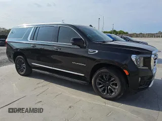 2022 GMC Yukon XL SLT z VIN 1GKS2GKD4NR141964, wystawiony jako Copart lot #57157795 z przebiegiem 48 131 mil mil oraz Czysty tytuł • Clean title. Historia ofert i sprzedaży dostępna na DreamBid. Obrazek 4.