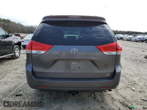 2014 Toyota Sienna LE with VIN 5TDJK3DC5ES093753, listed as a Copart auction lot 47452575 with 124,942 mi miles and Salvage Title. Bid and sale history available at DreamBid. Image 6.
