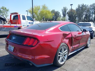 2016 Ford Mustang EcoBoost z VIN 1FA6P8THXG5252914, wystawiony jako IAAI lot #42184803 z przebiegiem 132 973 mil mil oraz . Historia ofert i sprzedaży dostępna na DreamBid. Obrazek 4.