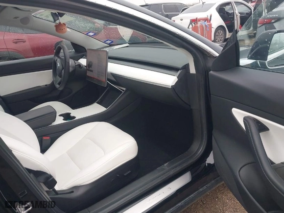 2020 Tesla Model 3 Performance with VIN 5YJ3E1EC1LF742792, listed as a IAAI auction lot 41541798 with NaN miles. Bid and sale history available at carsss.com. Image 5.