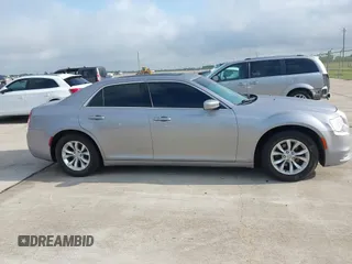 2016 Chrysler 300 Anniversary Edition with VIN 2C3CCAAG9GH211875, listed as a IAAI auction lot 42052083 with 209,251 mi miles and . Bid and sale history available at DreamBid. Image 13.
