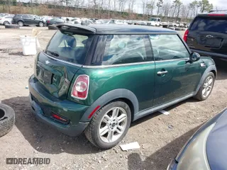 2013 MINI Cooper Hardtop S with VIN WMWSV3C58DT479336, listed as a IAAI auction lot 41995948 with 87,123 mi miles. Bid and sale history available at carsss.com. Image 4.