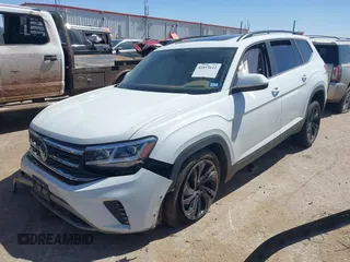 2022 Volkswagen Atlas SE z VIN 1V2JR2CA9NC542633, wystawiony jako IAAI lot #41853622 z przebiegiem 78 261 mil mil oraz . Historia ofert i sprzedaży dostępna na DreamBid. Obrazek 2.
