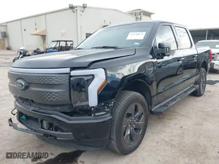 2023 Ford F-150 Lightning Pro with VIN 1FTVW1ELXPWG55836, listed as a IAAI auction lot 41328873 with 6,742 mi miles. Bid and sale history available at carsss.com. Image 18.