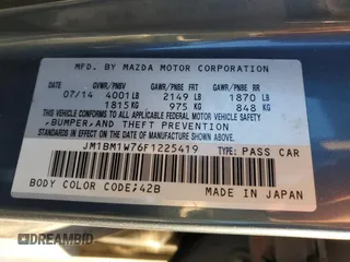 2015 Mazda 3 i Grand Touring z VIN JM1BM1W76F1225419, wystawiony jako Copart lot #74278093 z przebiegiem 102 059 mil mil oraz Szkoda całkowita • Salvage title. Historia ofert i sprzedaży dostępna na DreamBid. Obrazek 13.