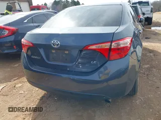 2018 Toyota Corolla L with VIN 5YFBURHE8JP807522, listed as a IAAI auction lot 41609439 with 76,573 mi miles and . Bid and sale history available at DreamBid. Image 16.