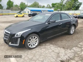 2014 Cadillac CTS Luxury AWD z VIN 1G6AX5S35E0190361, wystawiony jako Copart lot #54497655 z przebiegiem 32 664 mil mil oraz Szkoda całkowita • Salvage title. Historia ofert i sprzedaży dostępna na DreamBid. Obrazek 1.