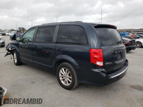 2014 Dodge Grand Caravan SXT with VIN 2C4RDGCGXER209286, listed as a Copart auction lot 51536975 with 173,821 mi miles and Salvage Title. Bid and sale history available at DreamBid. Image 2.