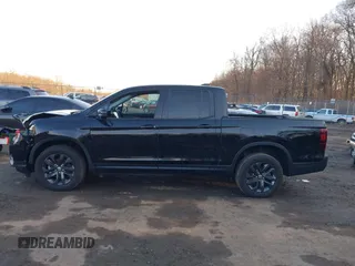 2024 Honda Ridgeline Sport with VIN 5FPYK3F14RB012334, listed as a IAAI auction lot 41542412 with 1,817 mi miles and . Bid and sale history available at DreamBid. Image 14.