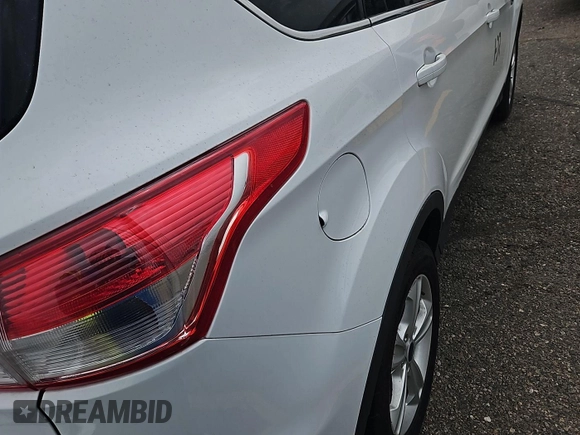 2014 Ford Escape SE with VIN 1FMCU9G94EUD80272, listed as a IAAI auction lot 42737727 with 138,226 mi miles and . Bid and sale history available at DreamBid. Image 11.