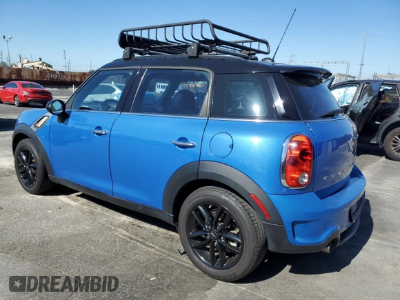 2013 MINI Countryman S with VIN WMWZC3C51DWP23167, listed as a Copart auction lot 63933185 with 72,329 mi miles and Salvage title. Bid and sale history available at DreamBid. Image 2.