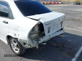 2006 Suzuki Aerio Premium z VIN JS2RA62S365300350, wystawiony jako IAAI lot #41492651 z przebiegiem 158 230 mil mil oraz . Historia ofert i sprzedaży dostępna na DreamBid. Obrazek 12.