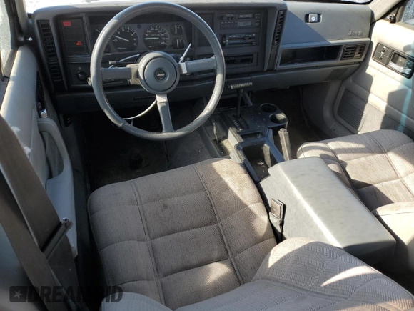 1994 Jeep Cherokee Sport with VIN 1J4FJ68S5RL135545, listed as a Copart auction lot 42397255 with 199,054 mi miles and Salvage Title. Bid and sale history available at carsss.com. Image 8.