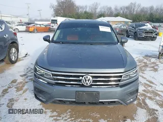 2018 Volkswagen Tiguan SEL Premium with VIN 3VV5B7AX9JM103745, listed as a IAAI auction lot 40993940 with 67,398 mi miles and . Bid and sale history available at DreamBid. Image 12.