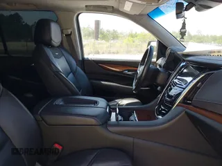 2020 Cadillac Escalade Luxury z VIN 1GYS3BKJ6LR124477, wystawiony jako IAAI lot #42042960 z przebiegiem 42 854 mil mil oraz . Historia ofert i sprzedaży dostępna na DreamBid. Obrazek 5.