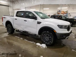2023 Ford Ranger XL with VIN 1FTER4FH2PLE18522, listed as a Copart auction lot 43559915 with 13,529 mi miles and Salvage Title. Bid and sale history available at carsss.com. Image 4.