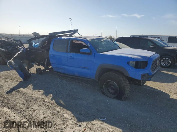 2020 Toyota Tacoma SR5 z VIN 3TMCZ5AN6LM310164, wystawiony jako Copart lot #47098995 z przebiegiem 18 285 mil mil oraz Szkoda całkowita • Salvage title. Historia ofert i sprzedaży dostępna na DreamBid. Obrazek 4.
