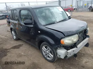 2009 Nissan Cube S z VIN JN8AZ28R59T105092, wystawiony jako IAAI lot #41786690 z przebiegiem 153 908 mil mil oraz . Historia ofert i sprzedaży dostępna na DreamBid. Obrazek 1.