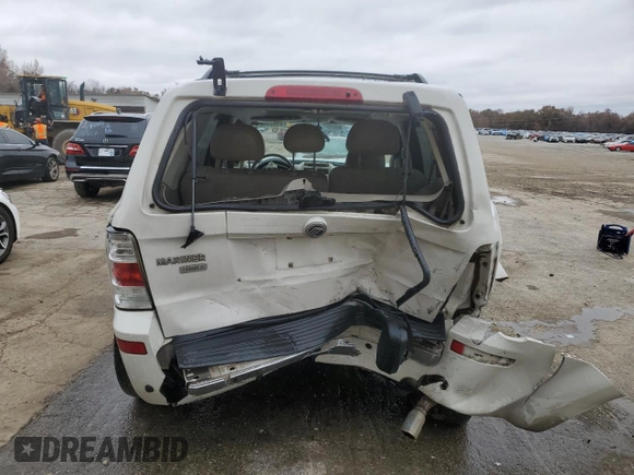 2009 Mercury Mariner Premier with VIN 4M2CU87G79KJ03236, listed as a Copart auction lot 84059324 with 130,335 mi miles and Salvage title. Bid and sale history available at DreamBid. Image 6.