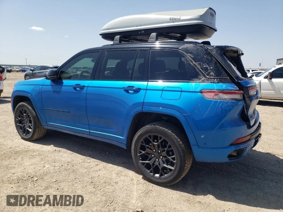 2023 Jeep Grand Cherokee Summit Reserve with VIN 1C4RJYE60P8881133, listed as a Copart auction lot 52354915 with 31,739 mi miles and Salvage title. Bid and sale history available at DreamBid. Image 2.