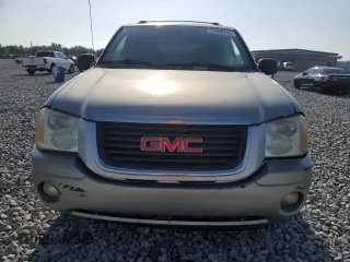 2003 GMC Envoy SLT z VIN 1GKDS13S032373020, wystawiony jako Copart lot #54986765 z przebiegiem 235 711 mil mil oraz Tytuł czysty. Historia ofert i sprzedaży dostępna na DreamBid. Obrazek 5.