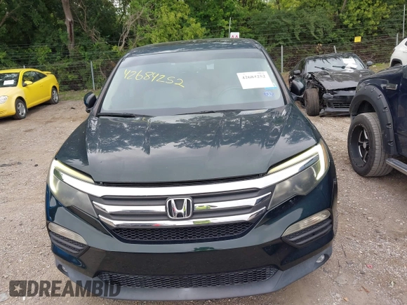 2016 Honda Pilot EX-L with VIN 5FNYF6H59GB100369, listed as a IAAI auction lot 42684252 with 146,609 mi miles and . Bid and sale history available at DreamBid. Image 6.