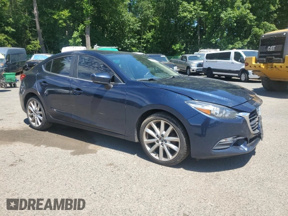 2017 Mazda 3 Touring with VIN JM1BN1V73H1125859, listed as a Copart auction lot 65023235 with 120,300 mi miles and Salvage title. Bid and sale history available at DreamBid. Image 4.