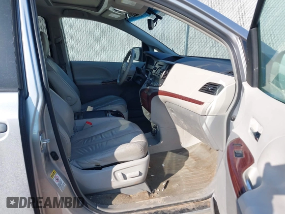 2013 Toyota Sienna XLE AAS with VIN 5TDYK3DC1DS391293, listed as a IAAI auction lot 41694041 with 181,913 mi miles. Bid and sale history available at carsss.com. Image 5.