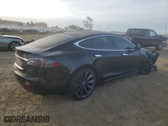 2017 Tesla Model S 100D with VIN 5YJSA1E27HF185487, listed as a Copart auction lot 47979455 with 184,987 mi miles and Salvage Title. Bid and sale history available at DreamBid. Image 3.