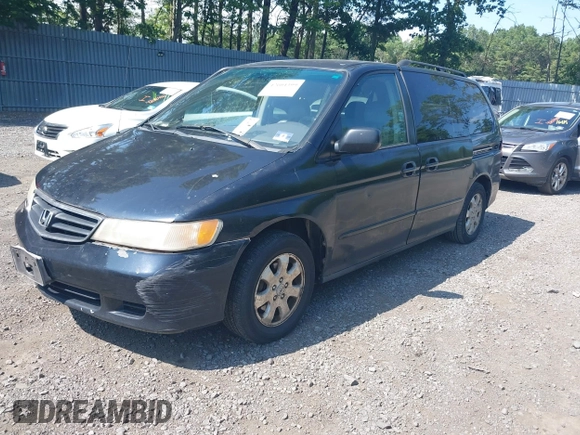 2003 Honda Odyssey EX-L with VIN 5FNRL18003B042487, listed as a IAAI auction lot 42604399 with 188,126 mi miles and . Bid and sale history available at DreamBid. Image 2.