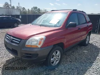 2005 Kia Sportage LX with VIN KNDJF723257132310, listed as a IAAI auction lot 41838054 with Not Provided miles and . Bid and sale history available at carsss.com. Image 2.