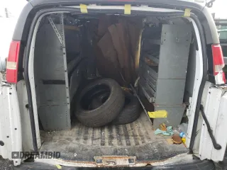 2013 Chevrolet Express Cargo z VIN 1GCZGTCG2D1192230, wystawiony jako Copart lot #73691204 z przebiegiem 170 078 mil mil oraz Szkoda całkowita • Salvage title. Historia ofert i sprzedaży dostępna na DreamBid. Obrazek 11.