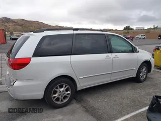 2004 Toyota Sienna XLE with VIN 5TDZA22C94S084569, listed as a IAAI auction lot 41482040 with 210,157 mi miles and . Bid and sale history available at DreamBid. Image 13.