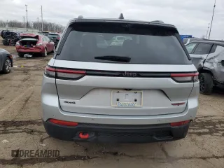 2022 Jeep Grand Cherokee Trailhawk with VIN 1C4RJHCG3N8625934, listed as a Copart auction lot 84533024 with 19,979 mi miles and Salvage title. Bid and sale history available at DreamBid. Image 6.
