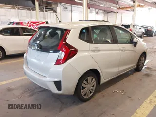 2015 Honda Fit LX with VIN 3HGGK5H57FM106670, listed as a IAAI auction lot 42097655 with 116,303 mi miles and . Bid and sale history available at DreamBid. Image 4.