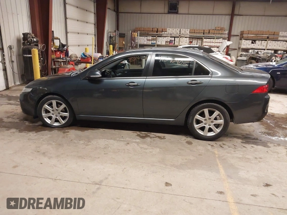 2005 Acura TSX with VIN JH4CL96975C034682, listed as a IAAI auction lot 41596405 with 228,889 mi miles and . Bid and sale history available at DreamBid. Image 14.