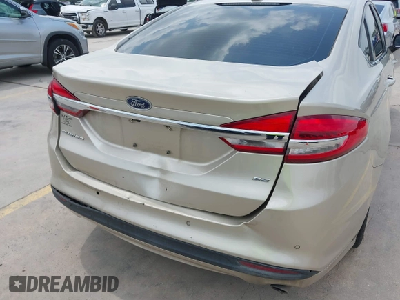 2018 Ford Fusion SE z VIN 3FA6P0H75JR176394, wystawiony jako IAAI lot #42169780 z przebiegiem 65 617 mil mil oraz . Historia ofert i sprzedaży dostępna na DreamBid. Obrazek 6.