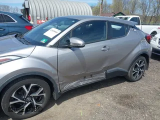 2018 Toyota C-HR XLE z VIN NMTKHMBX5JR046679, wystawiony jako IAAI lot #42068046 z przebiegiem 166 297 mil mil oraz . Historia ofert i sprzedaży dostępna na DreamBid. Obrazek 6.