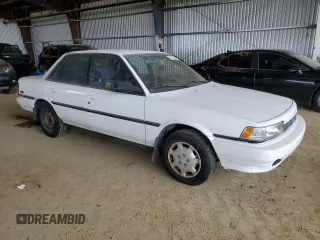 1991 Toyota Camry DLX z VIN 4T1SV21E1MU450315, wystawiony jako Copart lot #42772935 z przebiegiem 125 494 mil mil oraz Szkoda całkowita • Salvage title. Historia ofert i sprzedaży dostępna na DreamBid. Obrazek 4.