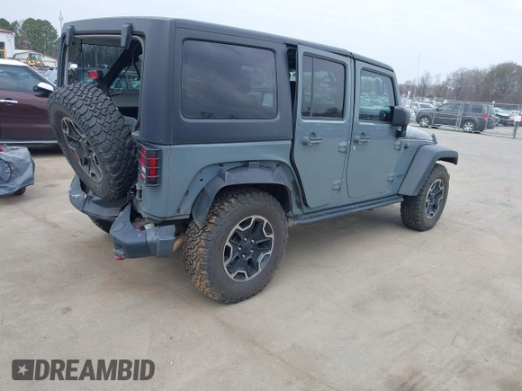 2015 Jeep Wrangler Unlimited Rubicon Hard Rock z VIN 1C4HJWFG1FL679873, wystawiony jako IAAI lot #41508722 z przebiegiem 97 165 mil mil oraz . Historia ofert i sprzedaży dostępna na DreamBid. Obrazek 4.