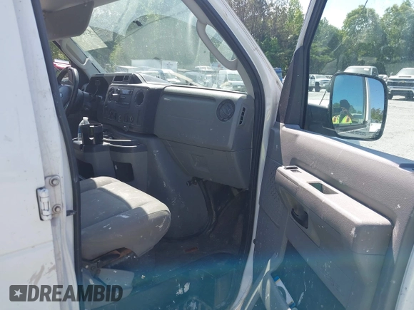2009 Ford Econoline Cargo with VIN 1FTNE24W99DA45347, listed as a IAAI auction lot 42068121 with 301,292 mi miles. Bid and sale history available at carsss.com. Image 5.