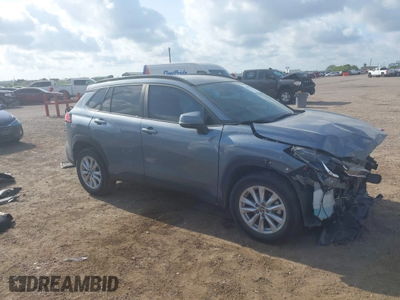 2022 Toyota Corolla Cross LE with VIN 7MUCAAAG0NV018245, listed as a IAAI auction lot 42039762 with 26,690 mi miles and . Bid and sale history available at DreamBid. Image 1.