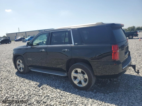 2015 Chevrolet Tahoe LTZ with VIN 1GNSCCKC9FR215932, listed as a Copart auction lot 52707765 with 232,801 mi miles and Clean Title. Bid and sale history available at carsss.com. Image 2.
