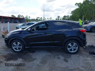 2021 Honda HR-V LX with VIN 3CZRU5H30MM727532, listed as a IAAI auction lot 41977847 with 64,364 mi miles. Bid and sale history available at carsss.com. Image 14.